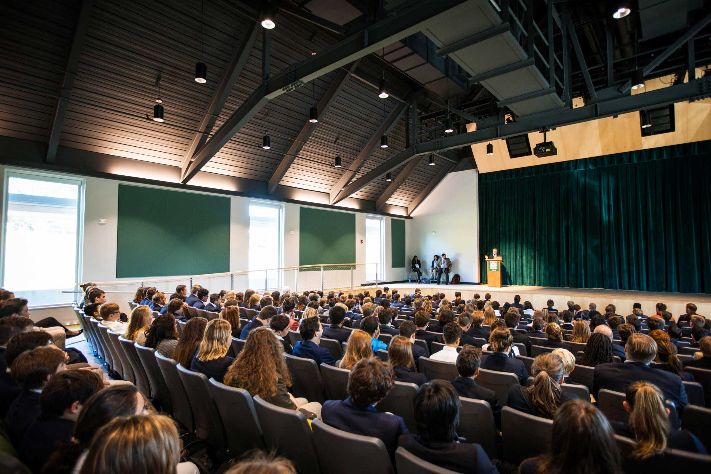 An assembly in the theater at Forman School.