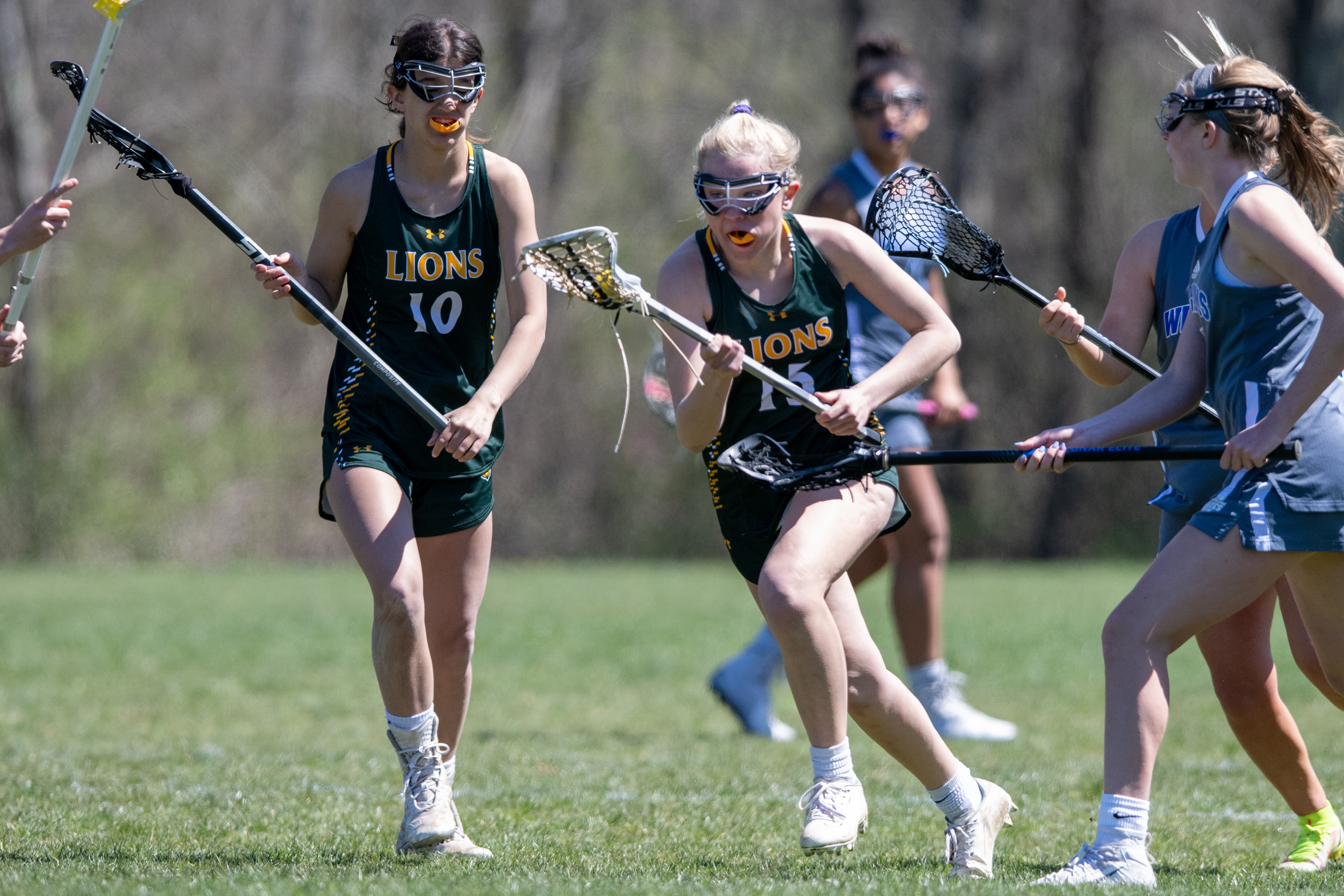 Girls playing lacrosse